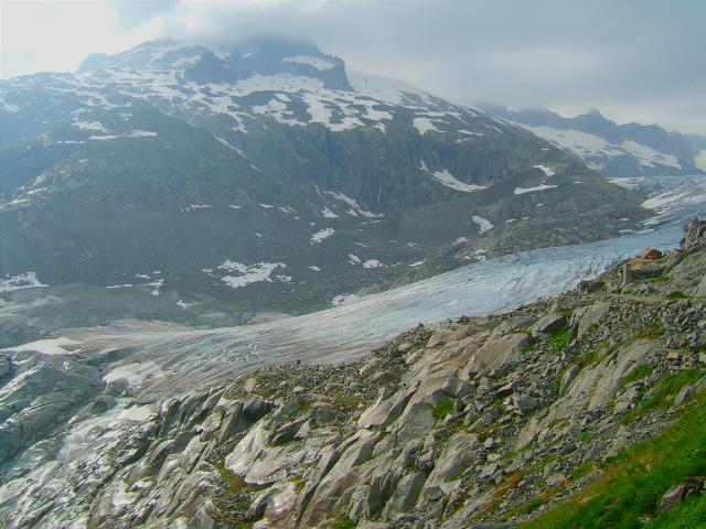 The Rhone Glacier, the water of the river flowing out of the ice at the left of the photo